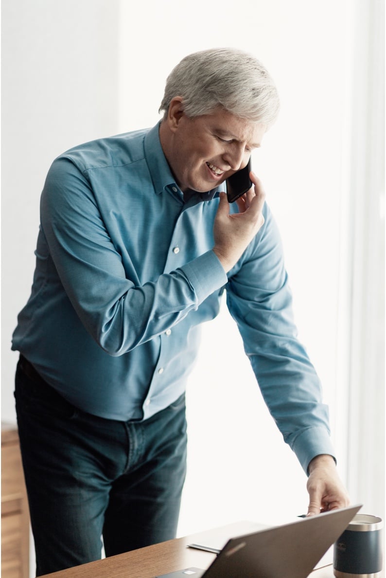 Shawn Sweeney on the phone with a client.